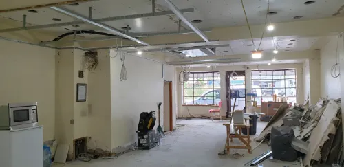 Empty salon with new ceiling construction