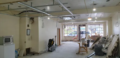 Empty salon with new ceiling construction