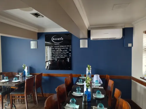 Wall-mounted AC unit in wine bar