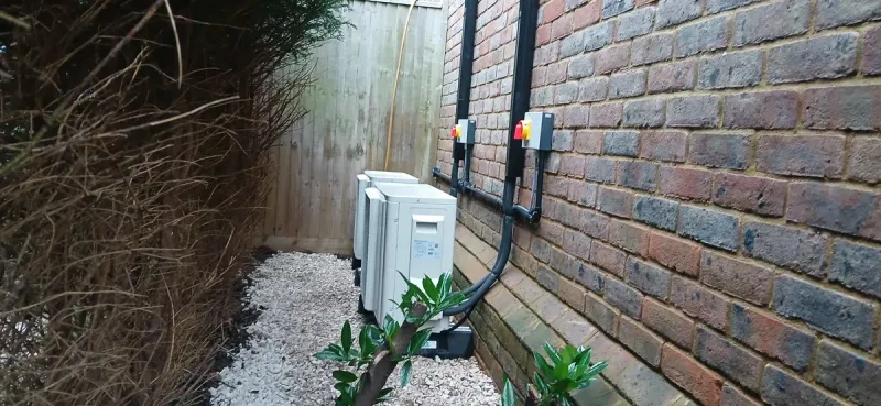 Certified engineer installing air conditioning