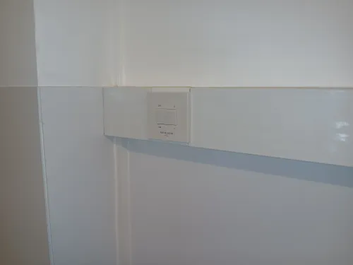 Power switch on dado rail