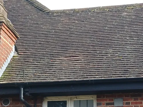 Wide view of tile roof with hidden vent
