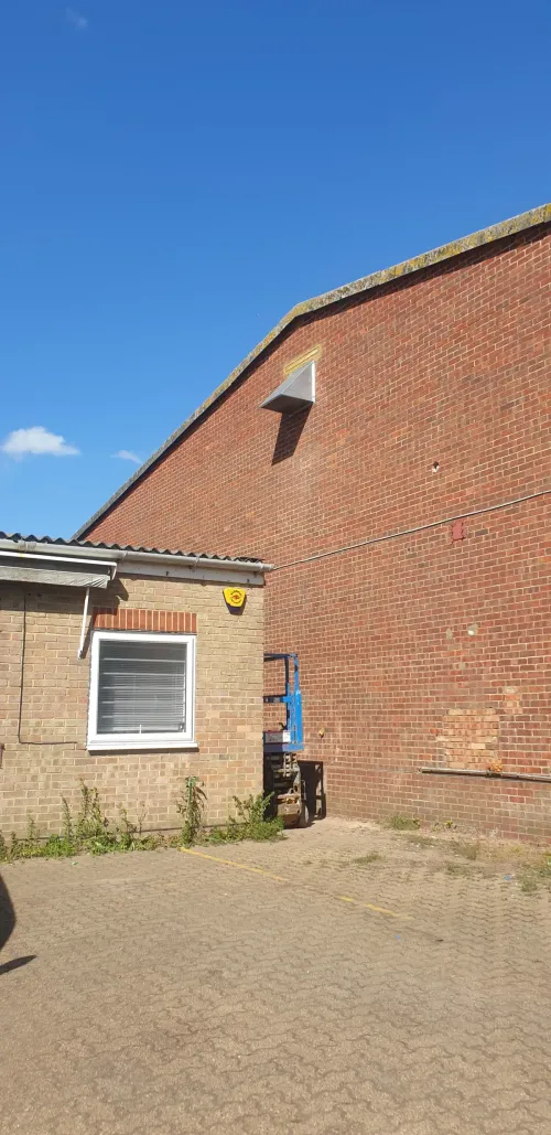 Industrial fan with weatherproof cowling