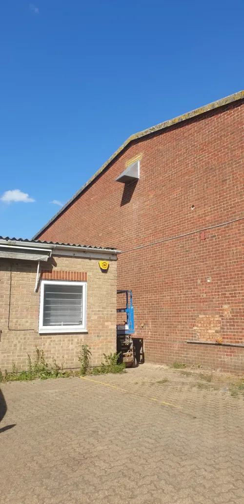 Industrial fan with weatherproof cowling