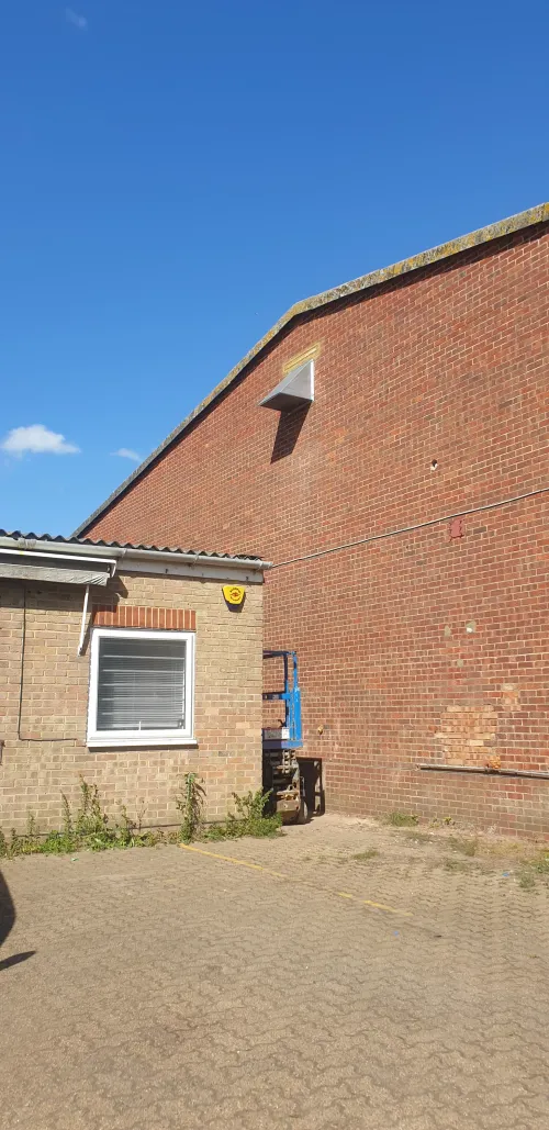 Industrial fan with weatherproof cowling