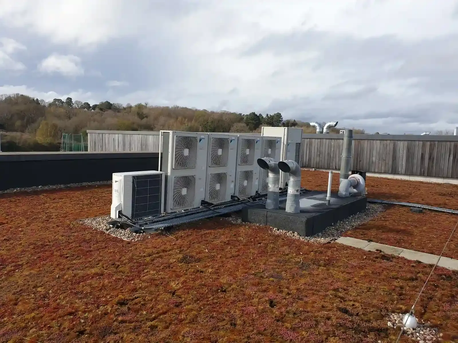 Ernest Air Cooling engineers fitting a Mitsubishi Electric multi-split system in Sussex residential property