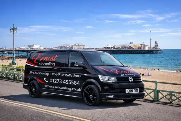 Ernest Air Cooling branded VW Transporter on Brighton seafront with the Palace Pier