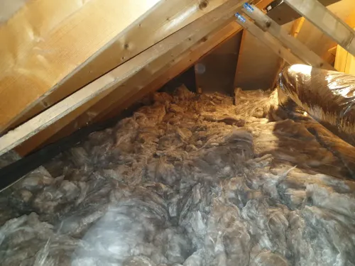 Hidden Daikin system with attic ductwork in Hove