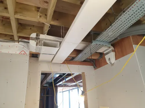 MVHR ducting branching ceiling in a South Downs property