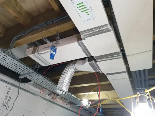 MVHR ducting with silencer in a South Downs property