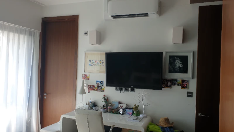 Indoor AC unit discreetly recessed into acoustic bulkhead