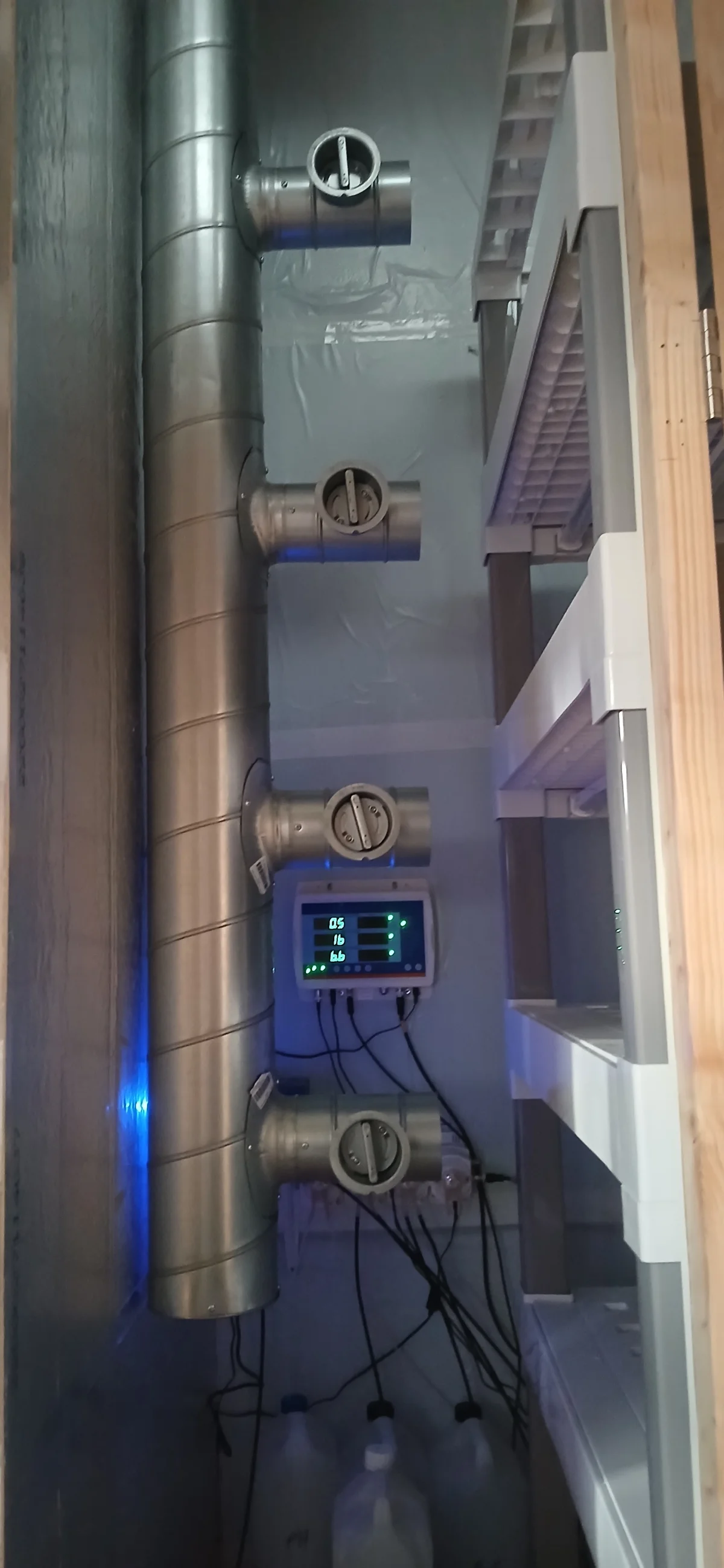 150mm galvanised spiral ducting with motorised volume control dampers for CO2 distribution to each growing tier