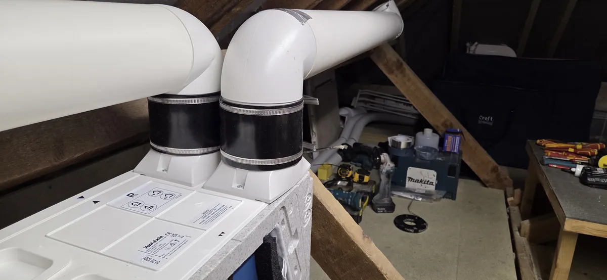 Close-up of sealed duct connections on a Vent-Axia MVHR unit